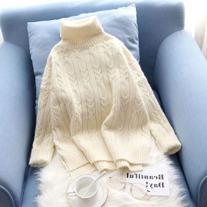 Pull col roulé torsadé