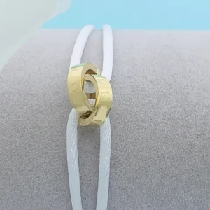 Bracelet cordon anneaux entrelacés